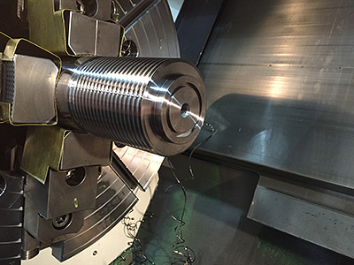 Machining tight tolerance threads